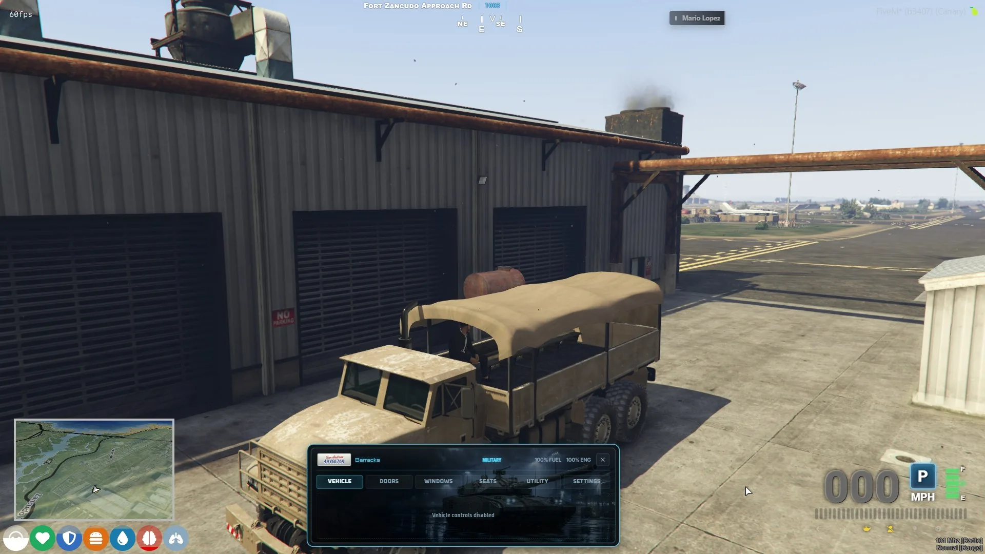 Seat controls open in a Barracks military transport.