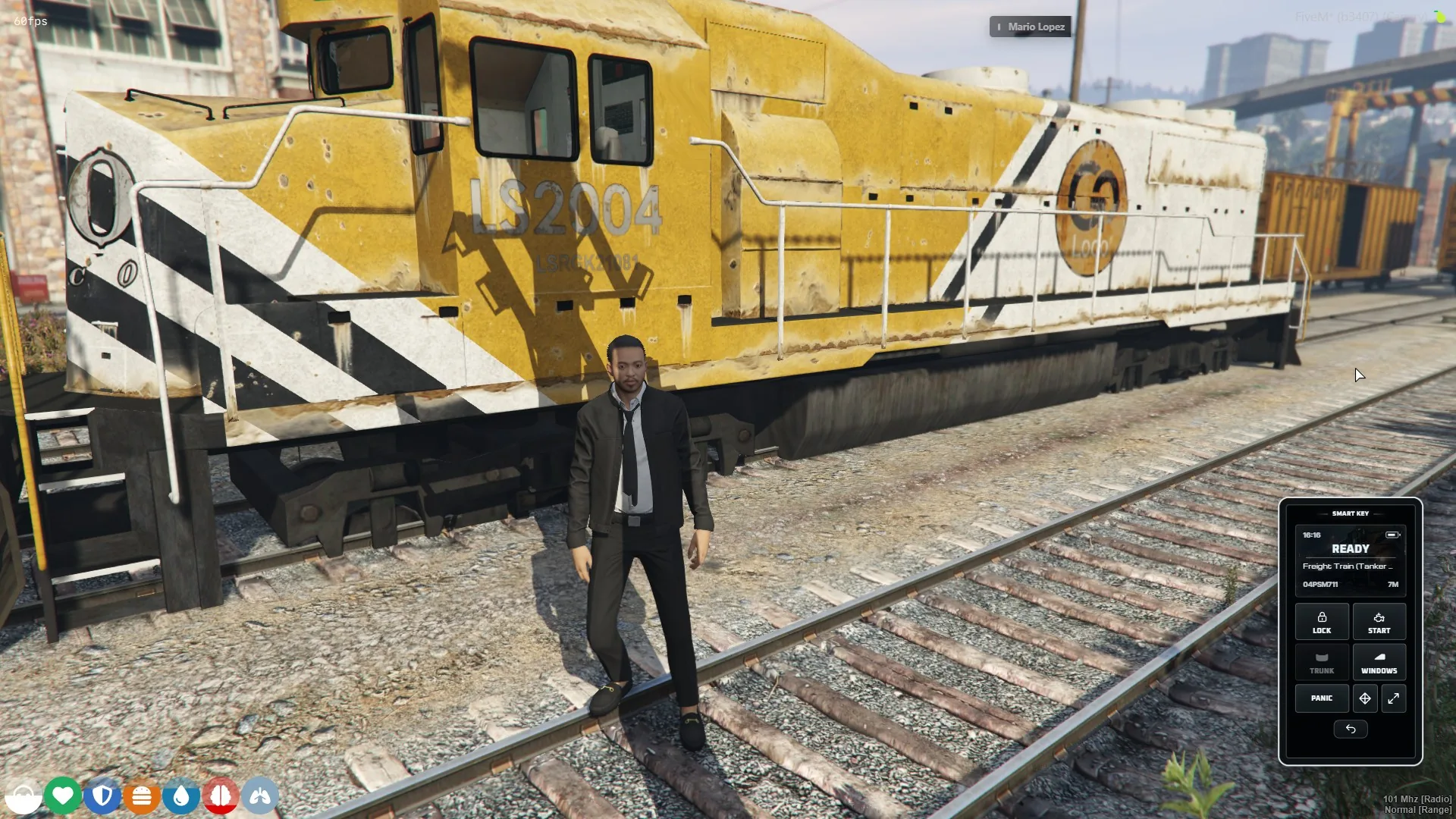 drs_vehcontrol smart key open beside a freight locomotive.