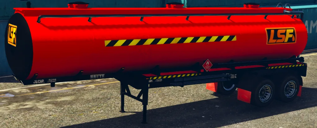 Red LS Freight fuel tanker trailer parked at the freight terminal.
