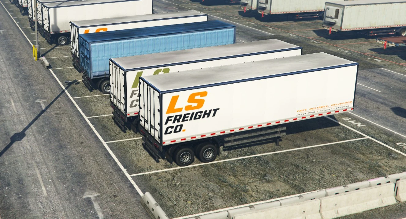 Three LS Freight trailer livery variants staged together at the port.